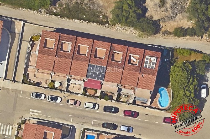 Foto 89a772a2-4d7d-45a0-9f54-69a4048d222a. Casa adossada amb aparcament piscina a Calafell poble Calafell