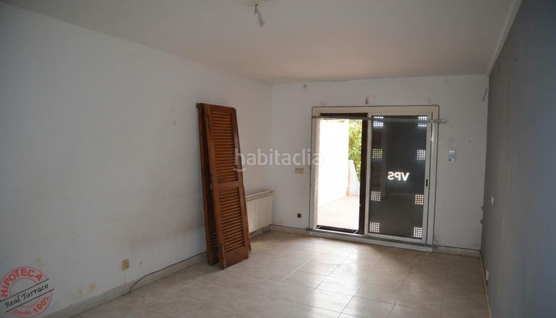 Foto 01ceddd8-69ec-4ff3-a58e-a3eff5f80675. Casa adossada amb aparcament a Creixell