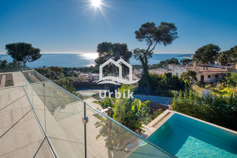 Foto 48362f80-83bc-451c-974b-89ed04c4e181. Chalet avec cheminée chauffage parking piscine dans Platja d´Aro