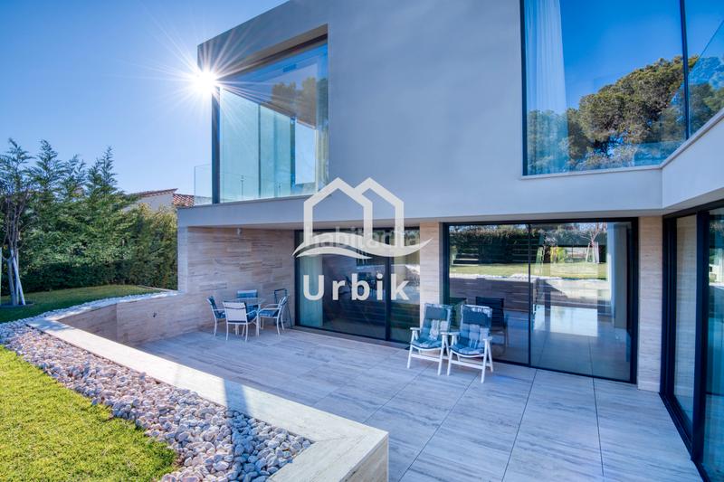 Foto f34b96b1-3398-4cd1-976a-e77fc1907f44. Chalet avec cheminée chauffage parking piscine dans Platja d´Aro