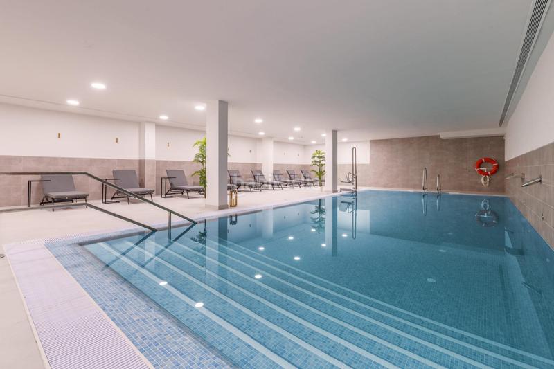 Foto e5a99d80-c9c4-442e-a25c-6cf24e182306. Apartament amb aparcament piscina a El Faro de Calaburra - Chaparral Mijas