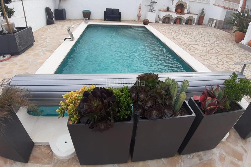 Foto 83b8c942-bc4f-4dc4-bad1-3651e7b5cca8. Chalet with heating parking pool in Centre Miami Platja