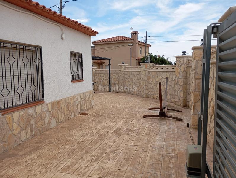 Foto 16db003d-3a57-4adf-9436-e489228f839c. Casa amb aparcament a Centre Miami Platja