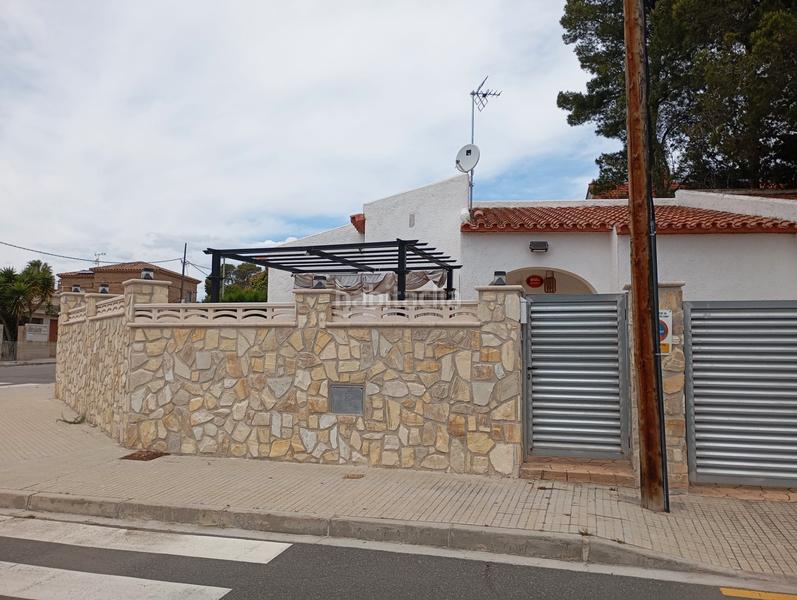 Foto 9f8effd1-fe84-45c1-8876-bb8c311f3baf. Casa amb aparcament a Centre Miami Platja