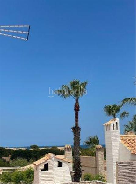 Foto 0c7c2619-853c-4ce8-9e74-84716f59fb5f. Casa adosada se vende adosado en port marí playa carabasí en Santa Pola
