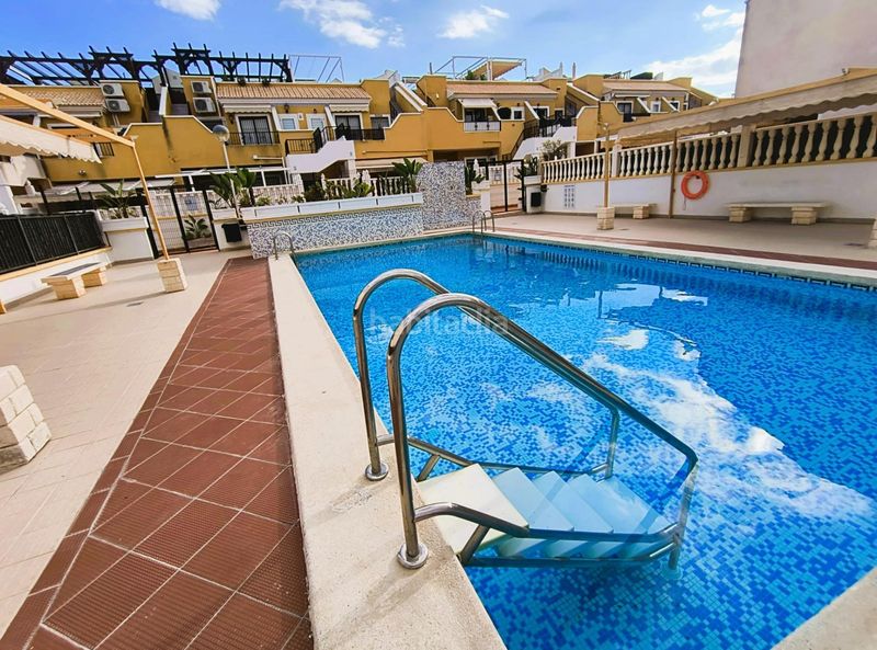 Foto 31c7ab8c-02d2-43c8-ab07-332816b7d312. Casa amb aparcament piscina a Los Arenales del Sol Elche / Elx