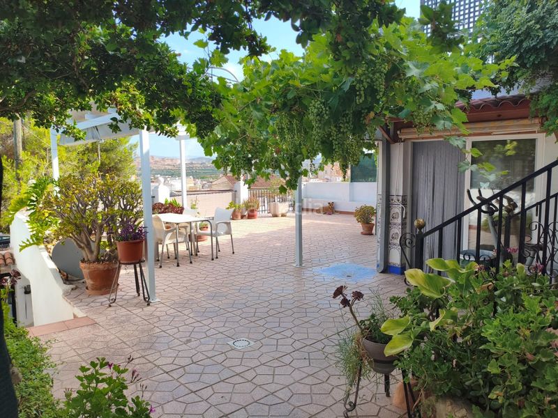 Foto 118a92b4-d972-4f11-ac00-f4c6a95a14a4. Casa amb aparcament a Vilamarxant
