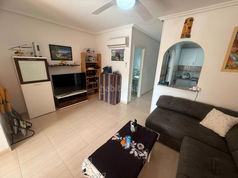 Foto 3127f438-2231-4dcb-9770-3821422547d1. Apartamento en avenida de almoradí 58 amplio salón con balcón , cocina moderna, 2 dormitorios, 2 baños, piscina,parking en Daya Nueva