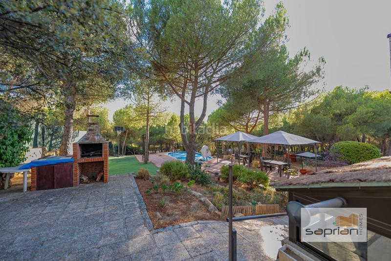 Foto 45b855d9-db4a-46f0-b324-697785fa1952. Casa amb piscina a Parquelagos-Puente Nuevo Galapagar