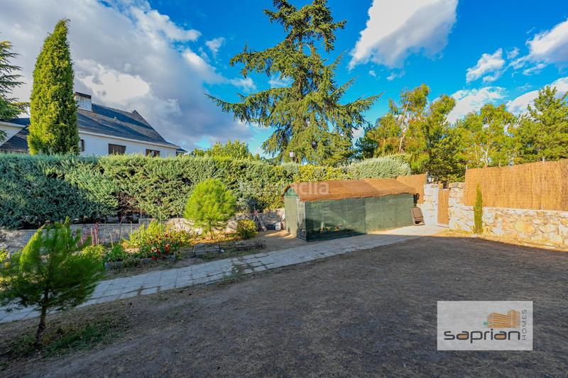 Foto 59ab66cb-a5f5-4e7d-b037-a0ba17eb91eb. Casa amb piscina a Parquelagos-Puente Nuevo Galapagar