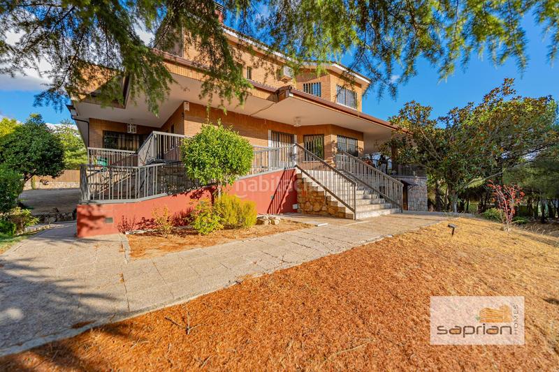 Foto d320418e-dada-4b74-bb90-8f03231278dd. Casa amb piscina a Parquelagos-Puente Nuevo Galapagar