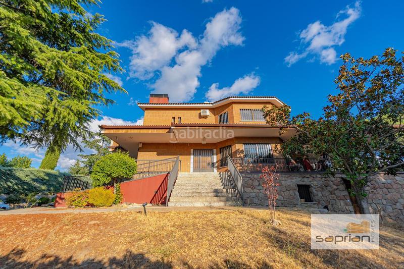 Foto dc0e0d6d-1abb-42f4-a42d-7d06df59e1c7. Casa amb piscina a Parquelagos-Puente Nuevo Galapagar