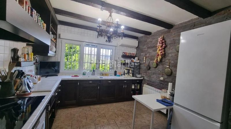 Foto a584145e-2d8c-4214-ad65-17b435d42e80. Casa amb calefacció aparcament piscina a Boalo (El)