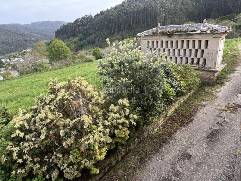 Foto f9092e78-f2df-47e3-acd2-b94d092ea5ad. Masia amb aparcament a Mañón