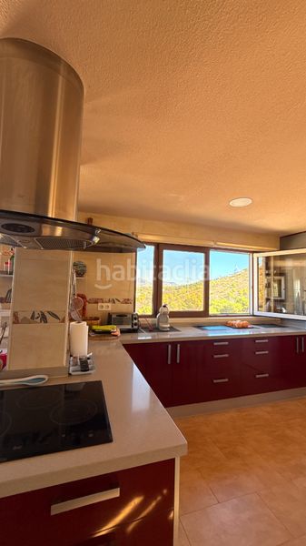 Foto c0bee62a-0a10-4179-88c5-1b042305b0c3. House with fireplace heating parking pool in Sierra Helada Benidorm