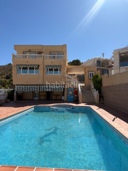 Foto f7015611-ff49-4ba2-8e8f-5ebf497cd56e. House with fireplace heating parking pool in Sierra Helada Benidorm