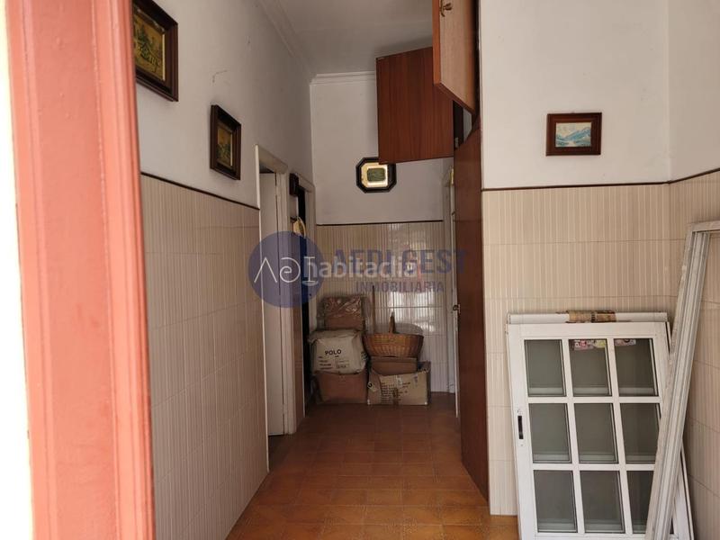 Foto b70c73dd-1699-46a5-9477-8880a2bbc003. Casa adossada a Lavadores Vigo