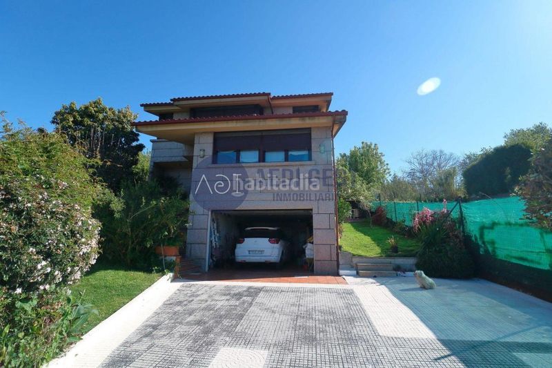 Foto 434b0735-0378-41a4-be36-d4067e739cf4. Chalet avec chauffage parking piscine dans Cabral - Candeán Vigo