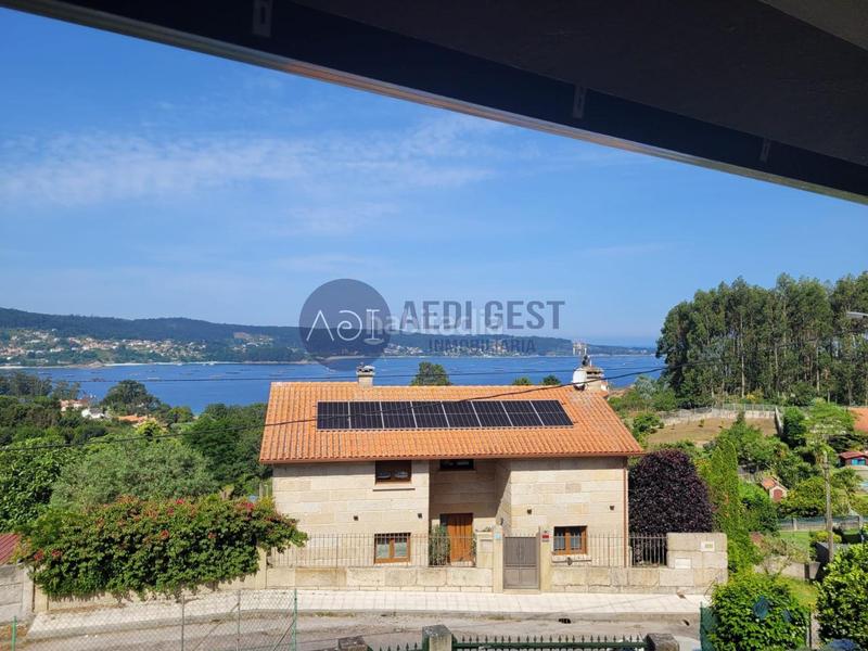 Foto 0640de23-0e25-422b-b4ac-107754ed1588. House with heating parking in Aldán Cangas