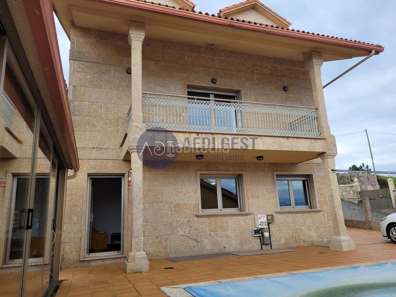 Foto 755af66b-4b0c-4124-8fc9-aac050d67fe4. Chalet avec chauffage parking piscine dans Baiona