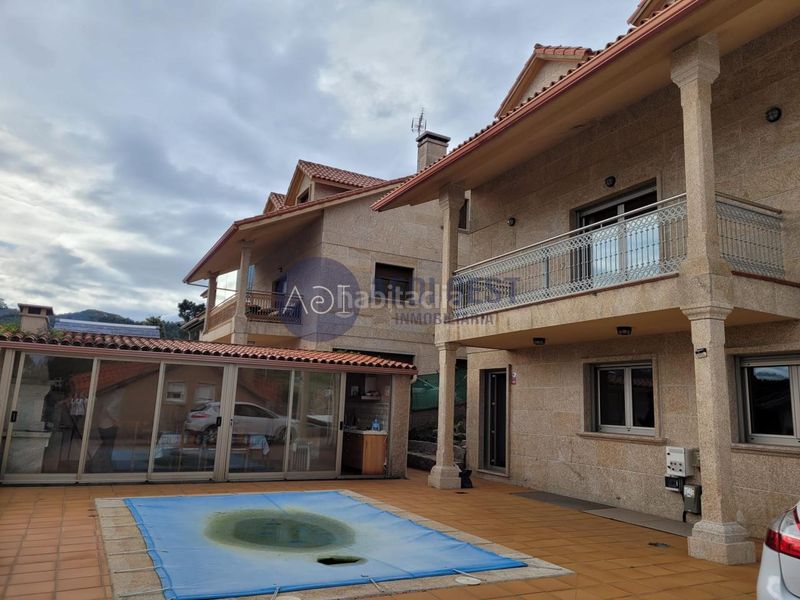 Foto 86c97090-564a-469c-8400-586fa7d3bbbc. Chalet avec chauffage parking piscine dans Baiona