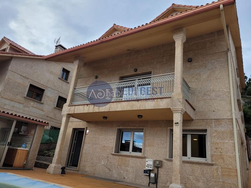 Foto cc28d410-9c2b-4df3-adc4-bedb085d42c2. Chalet avec chauffage parking piscine dans Baiona