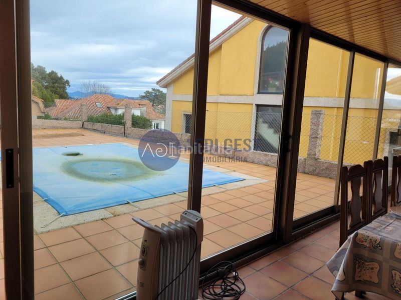 Foto fa524c85-ee70-4ce5-a3ca-e2e5c9065c48. Chalet avec chauffage parking piscine dans Baiona