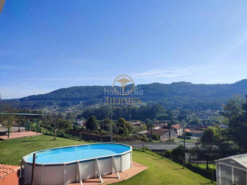 Foto a2bf226e-ddd2-4222-96dd-eb3c75d99a18. Casa amb calefacció aparcament piscina a Vilaboa