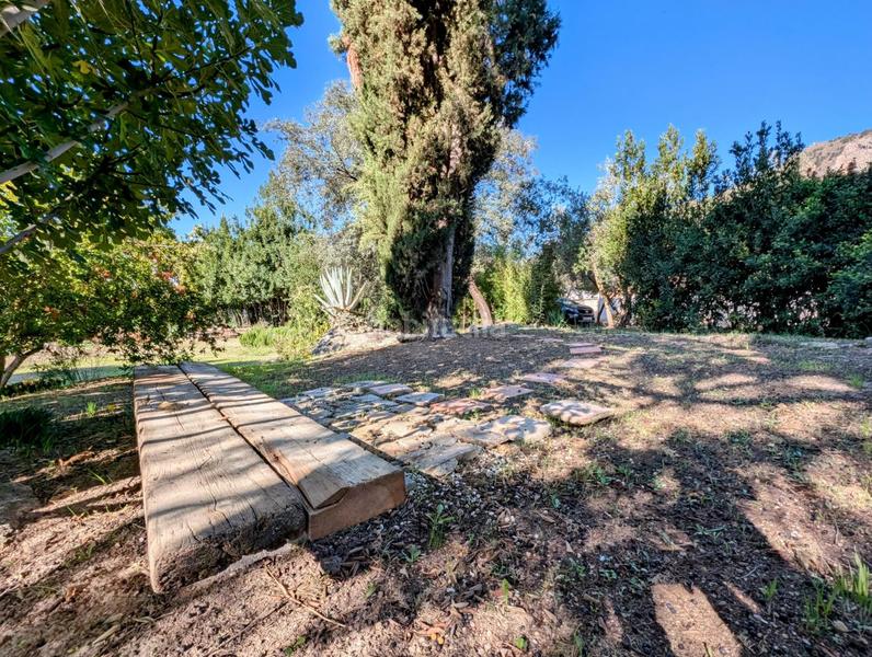 Foto 407956c1-f208-49ca-9fc1-330c4298047d. Chalet  en venta en la esperanza, 4 dormitorios. en Loja