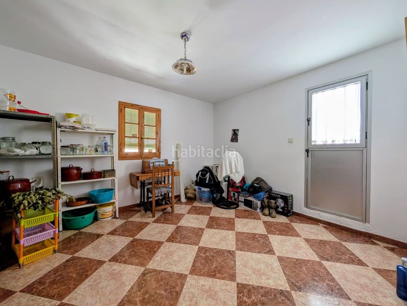 Foto fdc6ac32-ee7c-40cf-9abf-e5d3d1382842. Casa amb aparcament a Loja