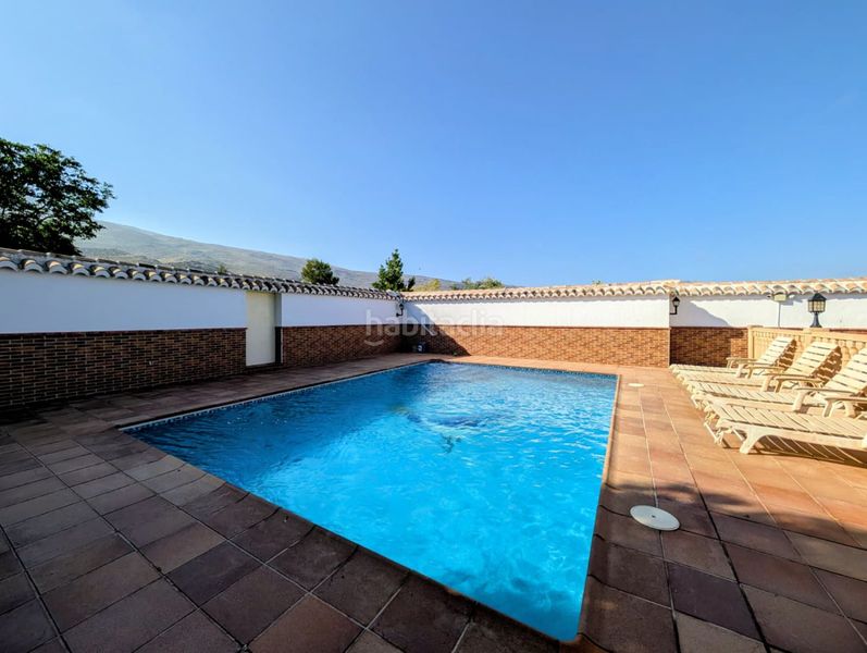Foto a5ec625d-1da1-4c0b-85b2-957420b58a04. Casa amb aparcament piscina a Loja