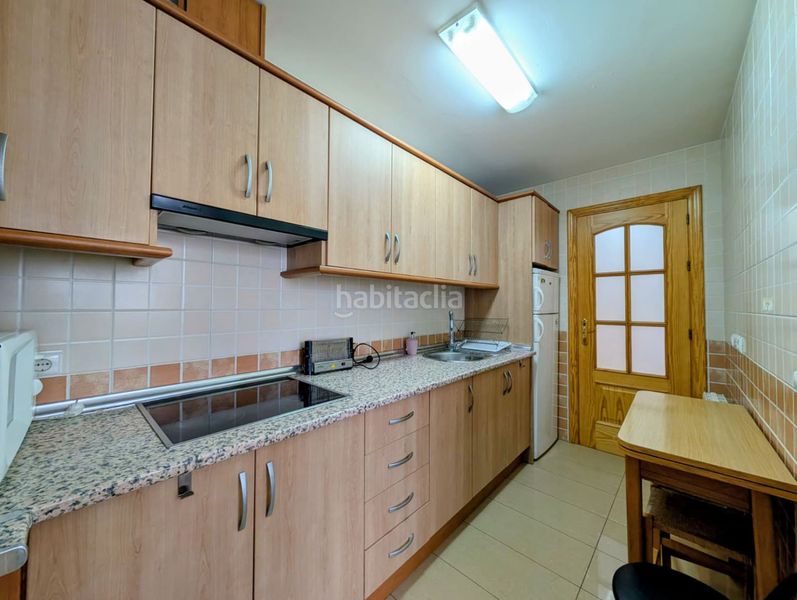Foto a875af39-3d78-45d6-9fed-bea0bd7a0bf7. Pis amb calefacció aparcament a Loja