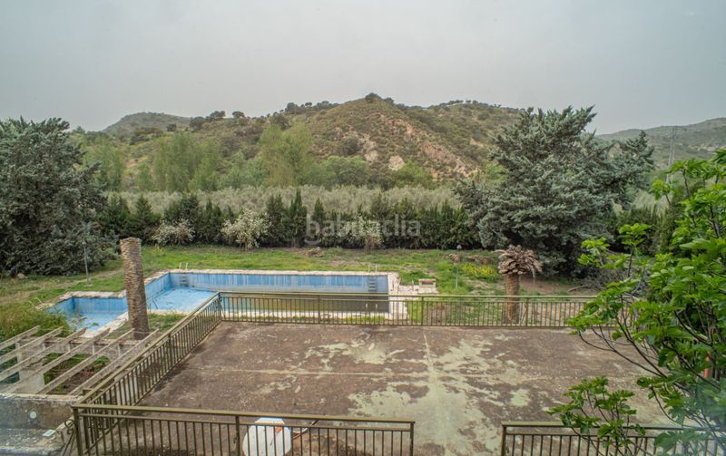 Foto a0ba7fa9-c1c6-4437-be3c-5536acabb361. Xalet amb aparcament piscina a Loja