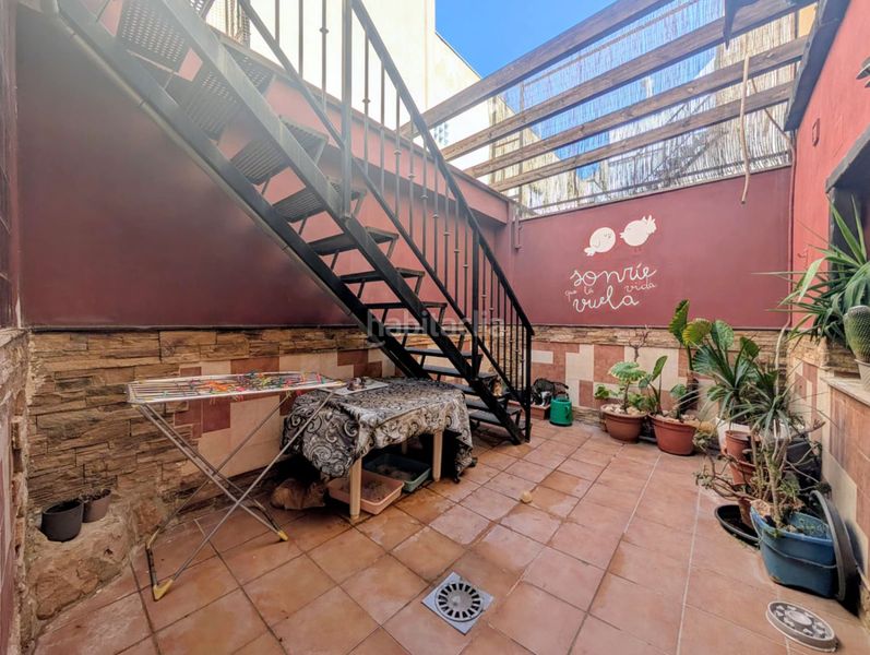 Foto 17424b82-ba85-47e3-8a74-16bb77b685d8. Casa adossada amb calefacció aparcament a Loja