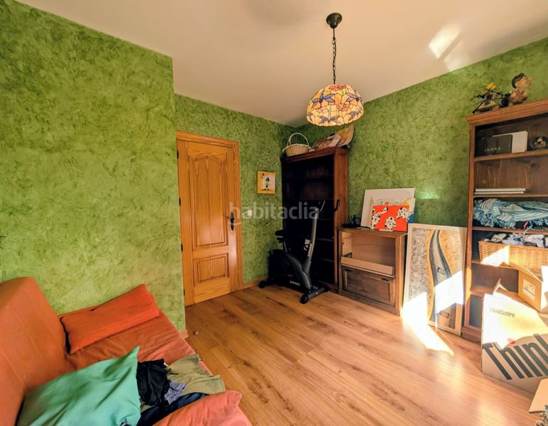 Foto ac595c57-e97c-4c1e-9fde-291dc41f17a8. Casa adossada amb calefacció aparcament a Loja