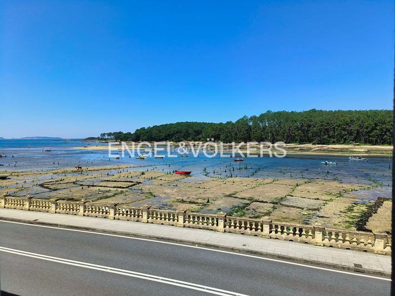 Foto 819f5a7b-c9b2-4cb5-9291-20434996e29e. Casa a schiera con riscaldamento piscina in O Carril Vilagarcía de Arousa