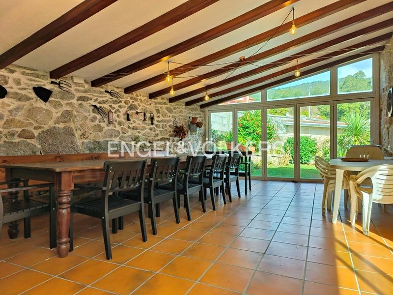 Foto 5800b7ba-29dd-4521-8f24-5869a3dbdbce. Casa  de piedra con jardín y piscina en chancelas en Poio
