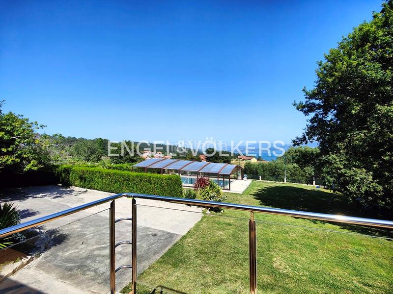 Foto d790fcec-037a-4117-b32c-aee756404dde. House with heating parking pool in Poio