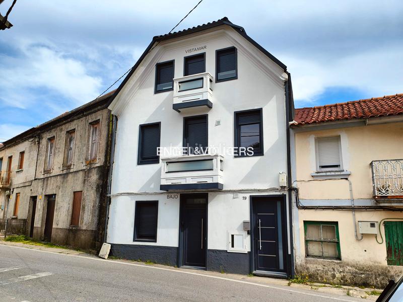 Foto fbcde2b8-51cf-4d9e-bf51-bf83f52262de. Haus mit heizung in Moaña