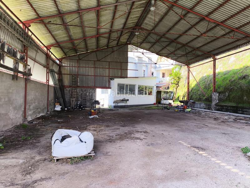 Foto 0a9fe24a-9472-4a44-b2a9-6e11b713aa24. Bâtiment à usage industriel dans Oseiro Arteixo