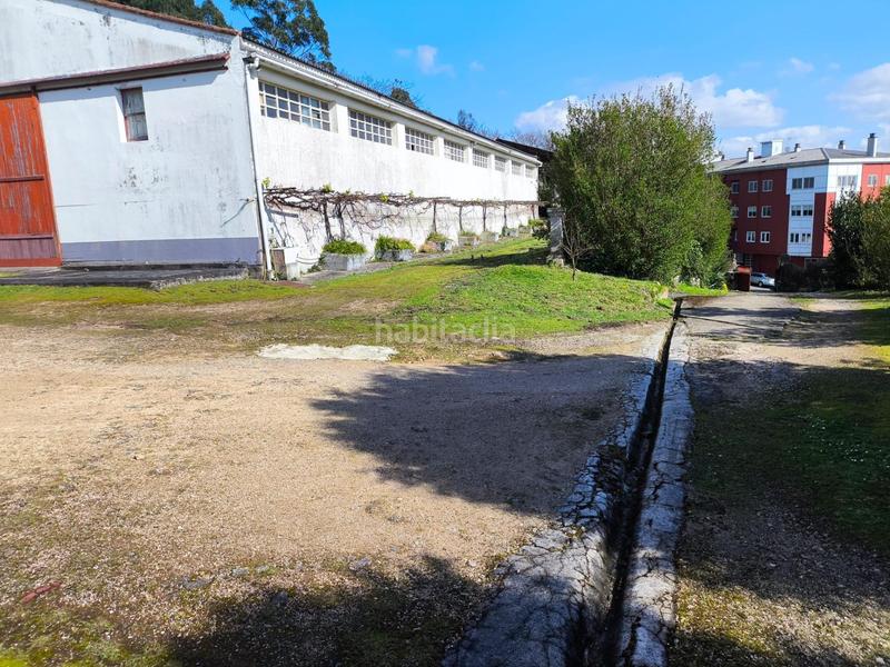 Foto a5bc0f56-5703-4e70-98b7-798a419f698c. Bâtiment à usage industriel dans Oseiro Arteixo