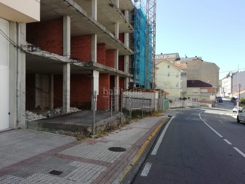 Foto 242a1afa-4776-4a42-bb99-d5c4b5dd973e. Edificio  en construcción en el centro en Laxe