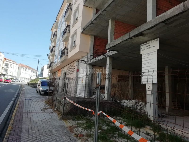 Foto eadddecb-d875-486b-825b-36ac664d1468. Edificio  en construcción en el centro en Laxe