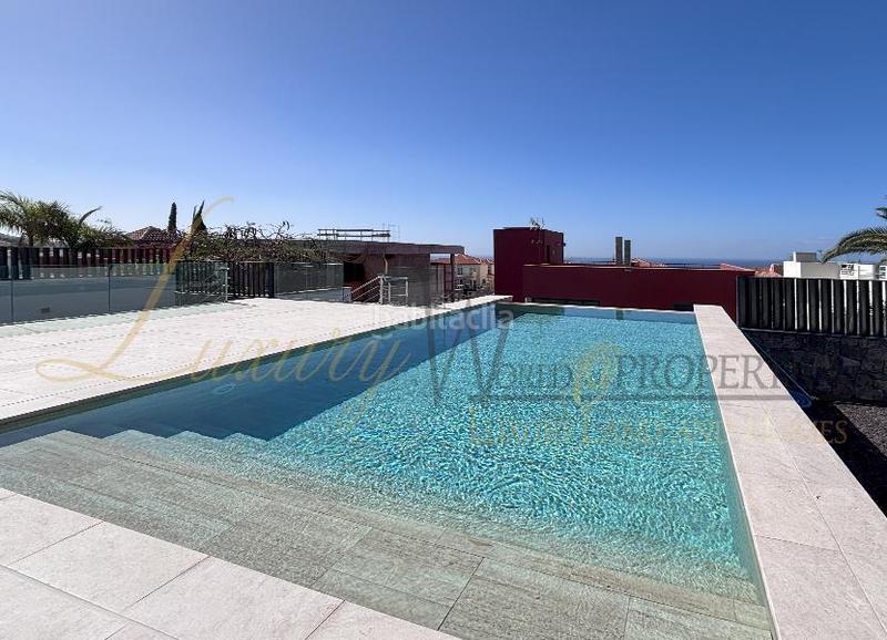 Foto f6beb330-125f-4a7c-9c48-660a1a69051a. Casa amb aparcament piscina a Playa Fañabé Alto Adeje