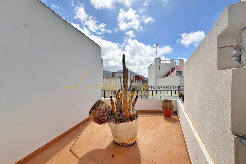 Foto 0a37aea6-dede-45d1-9646-42e58a6e1480. Casa amb aparcament a Guía de Isora interior Guía de Isora