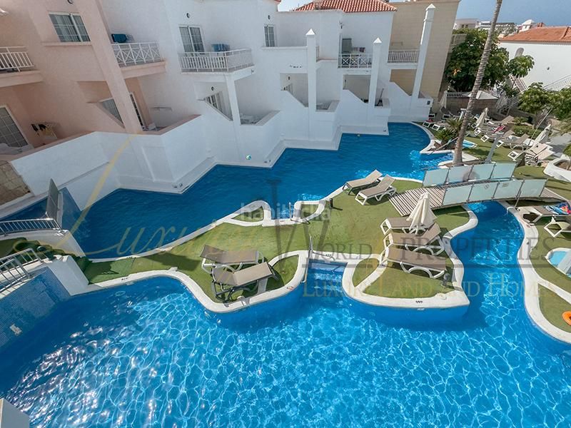 Foto eb01a8d4-4da7-4710-943e-bf6c2d35342f. Apartament amb piscina a Playa de Fañabé Adeje