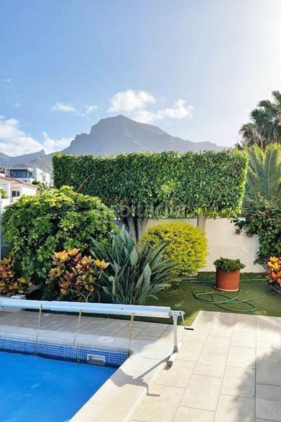 Foto 11837633-dd1a-4649-971b-5a3f46588dac. Casa adossada amb aparcament piscina a Playa Fañabé Alto Adeje