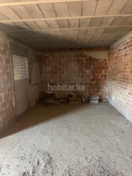 Foto 721d5a3d-f2f5-40f8-8991-9a86b66a0d2d. Edificio obra parada en venta en seros en Seròs