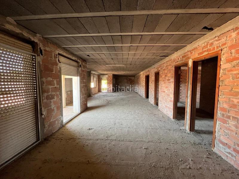 Foto 91a4bf20-4e39-40c4-bc6b-172b6f17d778. Edificio obra parada en venta en seros en Seròs