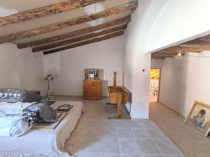Foto 6012fc4e-f547-41cf-9ebf-f427c7b1473f. Casa esta espaciosa villa de 4 dormitorios y 2 baños en chinorlet ofrece una excelente combinación de reformas completas y espacio para en Monòver